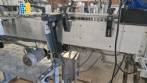 Etiquetadora autom�tica de doble cabezal para botellas planas Bauch Campos