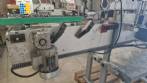 Etiquetadora automtica de doble cabezal para botellas planas Bauch Campos