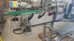 Etiquetadora automtica de doble cabezal para botellas planas Bauch Campos