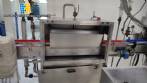 Lnea para llenado de salmuera, insercin manual de producto y taponado automtico
