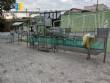 Llenadora lineal autom�tica de 6 boquillas con enjuagadora y tapadora. Capacidad: 1800 botellas por hora.