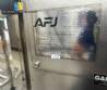 T�nel de enfriamiento con m�quina de recubrimiento y tanque de fusi�n de chocolate AFJ 2024