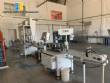 Llenadora lineal con roscadora de acero inoxidable 12 boquillas Narita