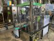 Llenadora rotativa gravim�trica de acero inoxidable con cabina