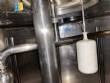 Llenadora rotativa gravim�trica de acero inoxidable con cabina