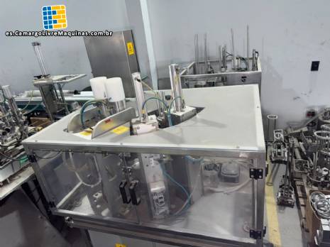 M�quina dosificadora rotativa autom�tica con selladora para vasos Delgo, 3500 vasos por hora.