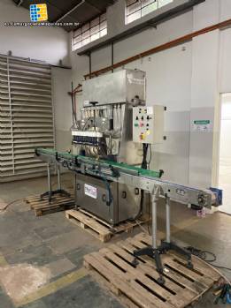 M�quina llenadora gravim�trica lineal de acero inoxidable de 12 ca�os TRUE