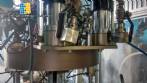 Lnea para mquina de llenado de aerosol Cosmar Omas