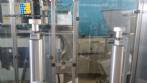 Lnea para mquina de llenado de aerosol Cosmar Omas