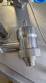 M�quina rotativa de acero inoxidable para llenado, dosificaci�n y sellado, con junta de aluminio, para tarros, vasos y botellas Delgo.