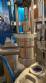 M�quina rotativa de acero inoxidable para llenado, dosificaci�n y sellado, con junta de aluminio, para tarros, vasos y botellas Delgo.