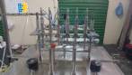 Llenadora lineal con sistema de llenado de 6 pistones
