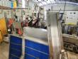 Elevador de posicionamiento y llenado de tapas para la industria de maquinaria SLP