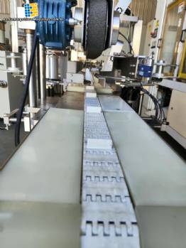 Aplicador de sellos para cartuchos de 3 solapas para productos importados con cabezal de impresión doble Tecmaes Aplicador de sellos para cartuchos de 3 solapas para productos importados con cabezal de impresión doble Tecmaes